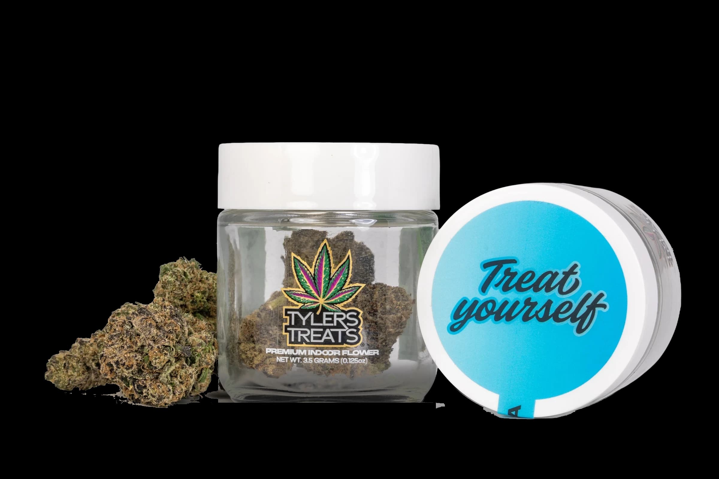 Tyler’s Treats 3.5g jar with a blue Indica lid next to a whole flower bud